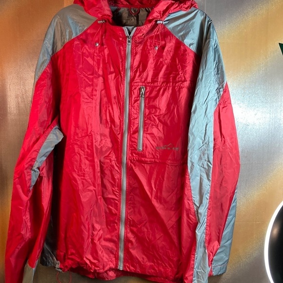 Extremely lightweight pack able Eddie Bauer windbreaker. Size L. Red &‎ Grey. K